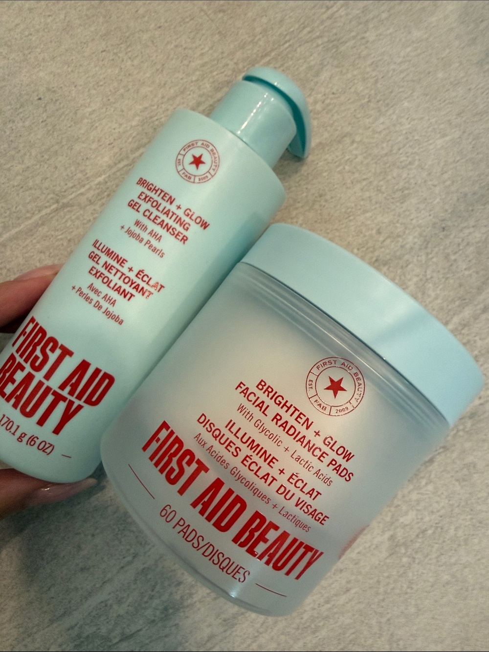First Aid Beauty Brighten + Glow Set exfoliating gel cleanser & facial pads 2 pc